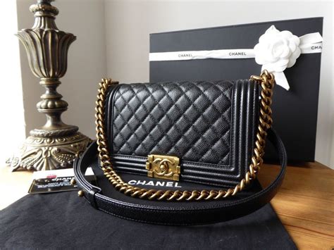 chanel boy bag gold and black|BOY CHANEL .